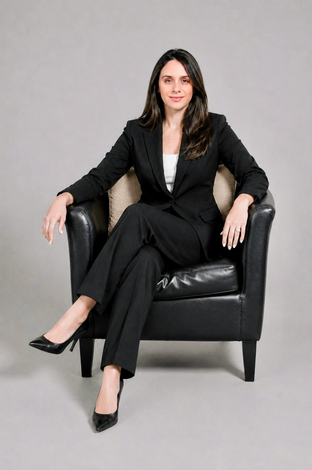 Attorney Najda Kazarian seated in her office
